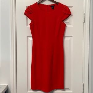 Bright red form fitting dress